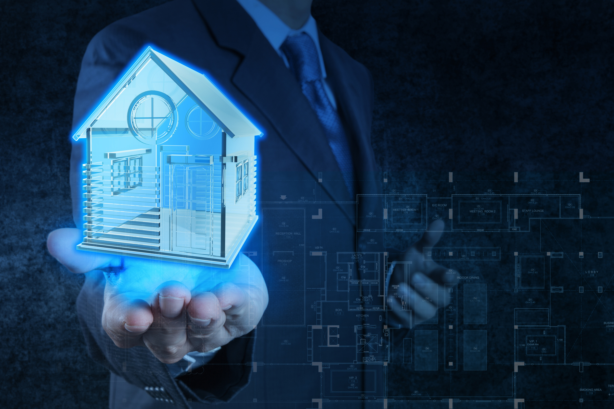 Mann mit blau leuchtendem Haus schwebend auf der Hand